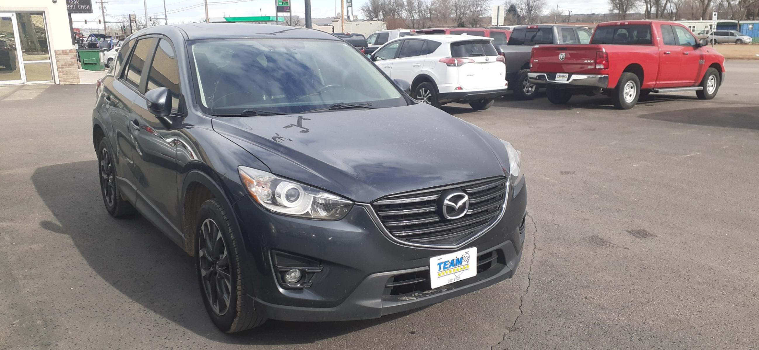 2016 Mazda CX-5 (JM3KE4DY5G0) , located at 2015 Cambell Street, Rapid City, SD, 57701, (605) 342-8326, 44.066433, -103.191772 - CARFAX AVAILABLE - Photo #3